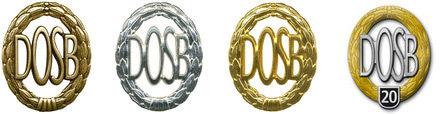 Abbildung mehrerer Medaillen in Gold, Silber und Bronze mit dem Schriftzug „DOSB“ und einem speziellen Medaillen-Design.